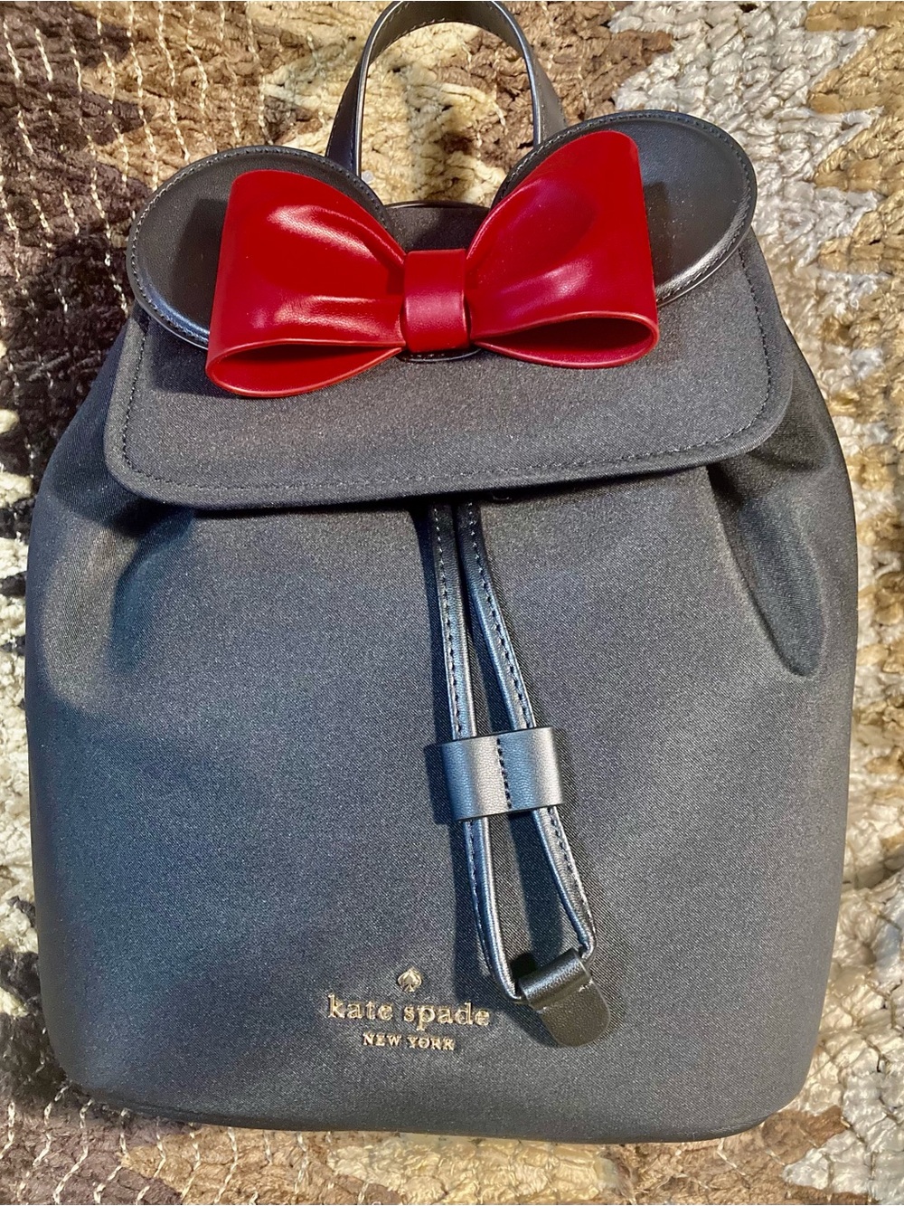 kate spade black backpack with red bow and ear accents